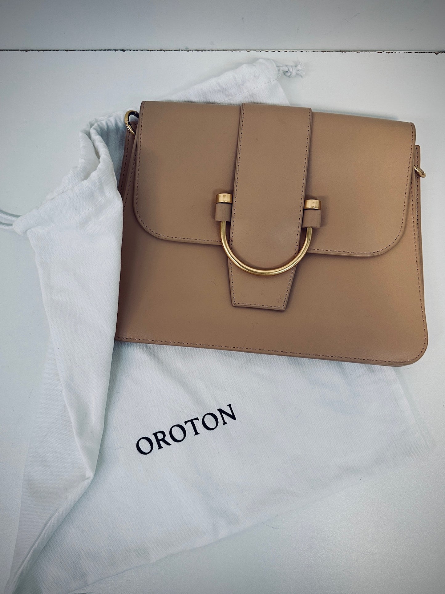 Oroton leather crossbody bag in caramel colour