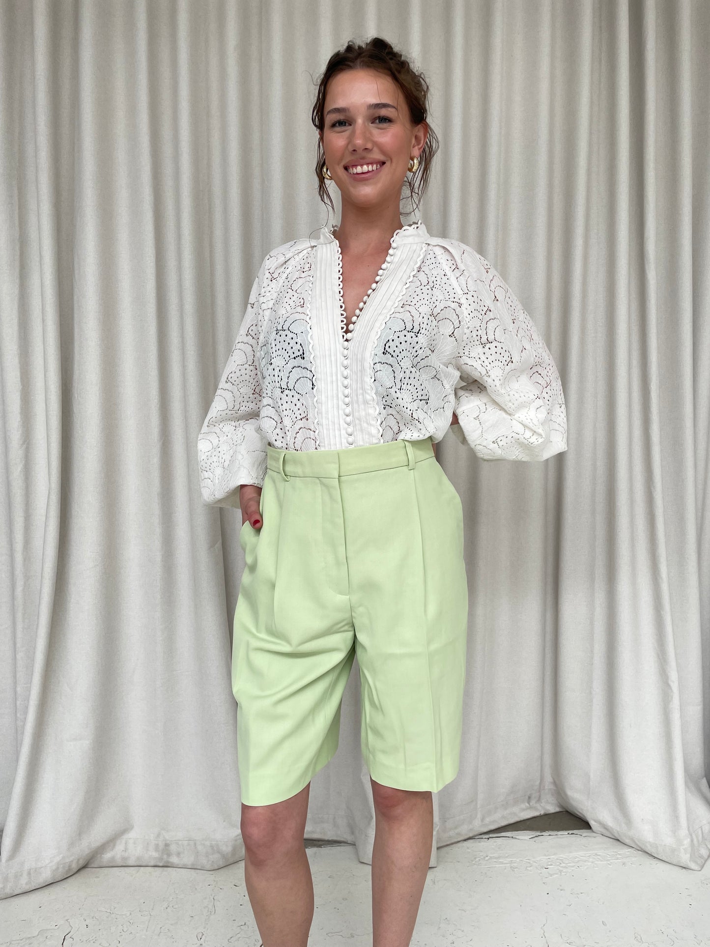 Lime green Acne Studios long wide leg shorts 42