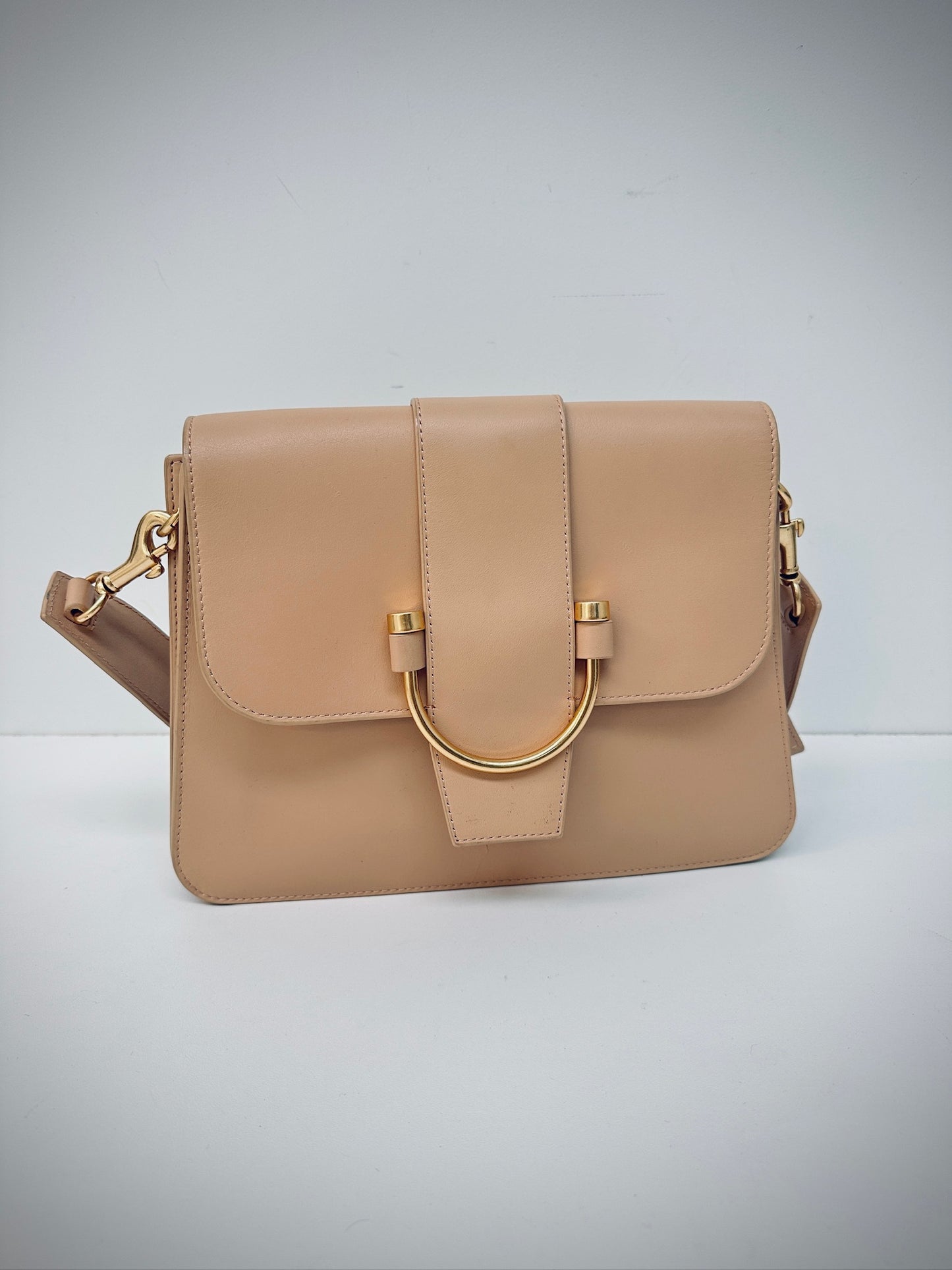 Oroton leather crossbody bag in caramel colour