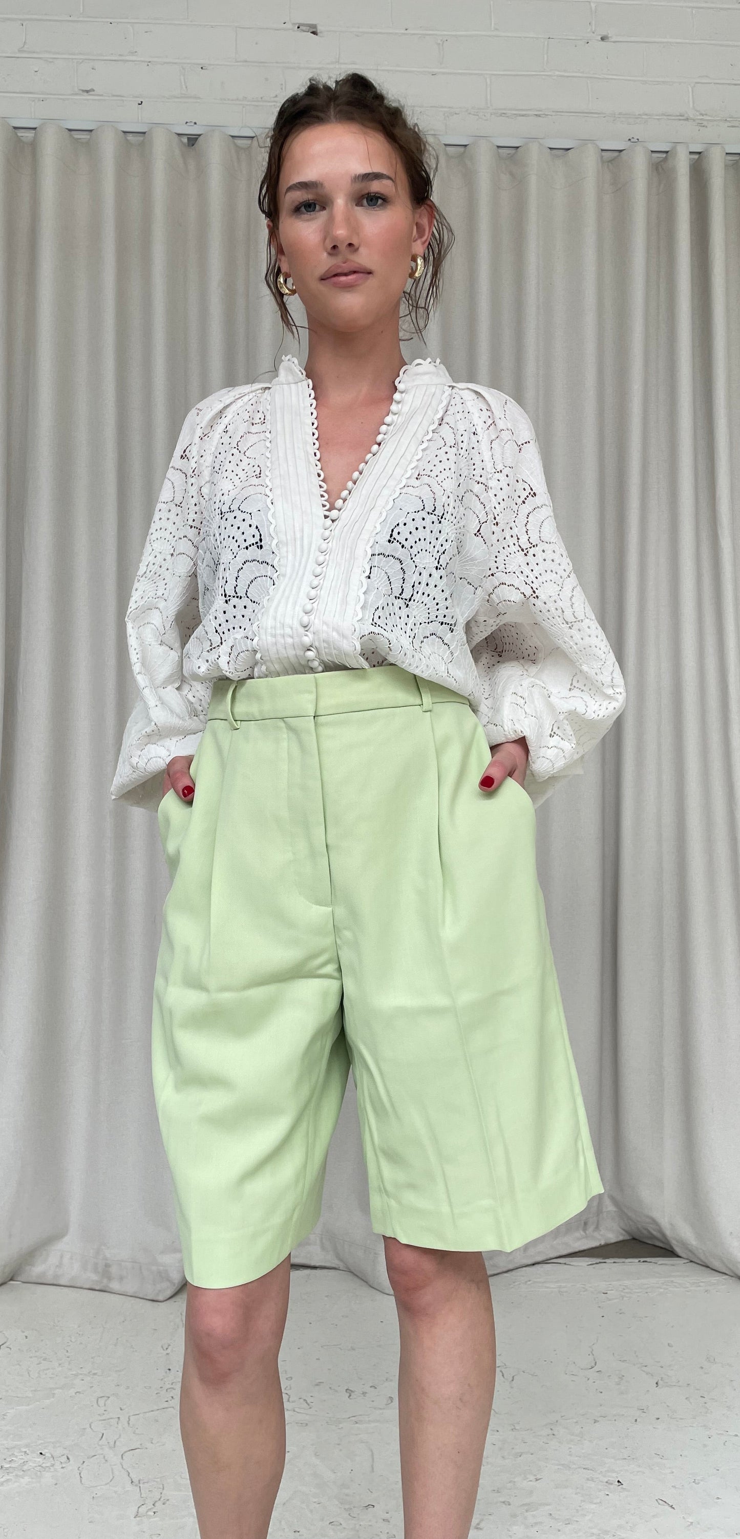 Lime green Acne Studios long wide leg shorts 42