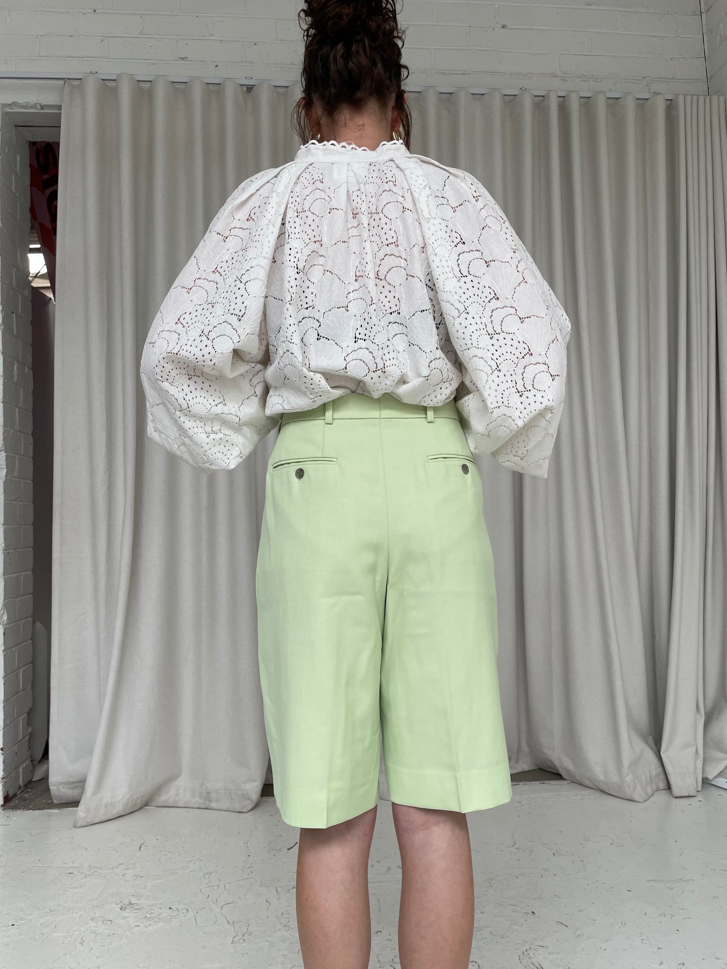 Lime green Acne Studios long wide leg shorts 42