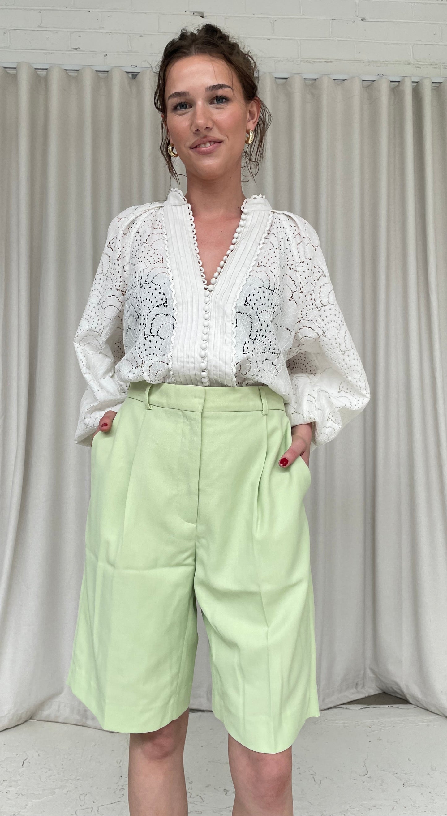 Lime green Acne Studios long wide leg shorts 42