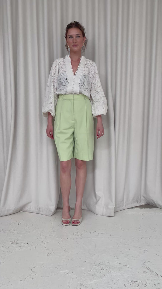 Lime green Acne Studios long wide leg shorts 42
